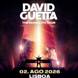 David Guetta The Monolith Tour poster featuring a colossal glowing monolith with a performer on a platform against a dark space backdrop, Lisbon event information included.